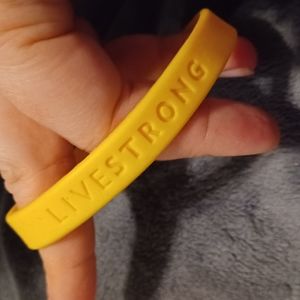 Yellow  "Live Strong" rubber bracelet